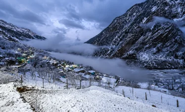 Get View of Snow Covered Mountains in Harsil